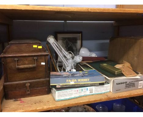 Shelf of assorted including sewing machines