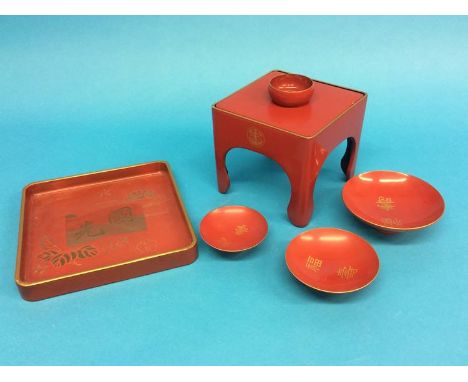A World War II Japanese Imperial army sake cup tray and a Japanese military Yokosuka navy lacquered tray and cup set