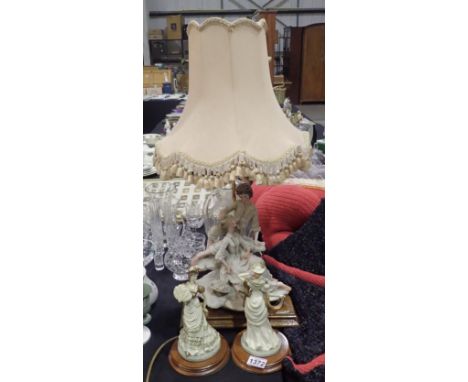 Figural lamp and two matching figurines