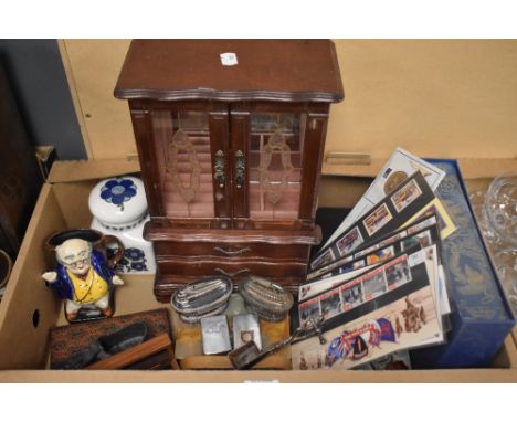 A miscellaneous selection of items including a large wooden cabinet style jewellery box, a reproduction Bosons whistle in a w