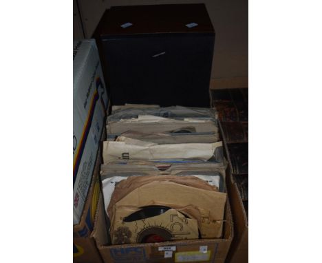 A vintage Toshiba speaker and a selection of shellac records.