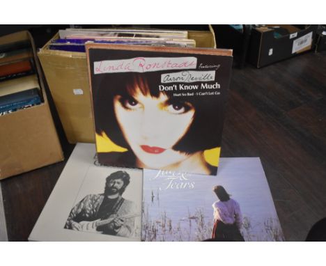 A nice selection of LP records including a four compact disc collection from Eric Clapton-Crossroads, The Motown Story-58 Gol