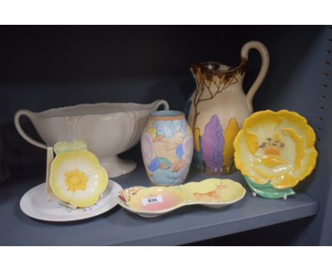 An Art Deco Beswick Ware jug, hand decorated in a Clarice Cliff style pattern and measuring 28cm high, together with other ce