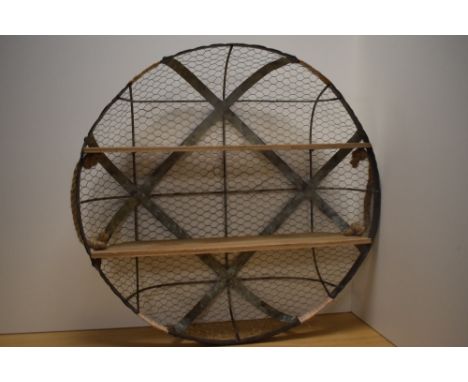 A shabby chic style wall shelf .
