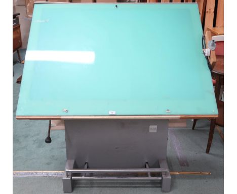 A 20th century Alpia Besancon drafting table with adjustable top with integrated light box on rise and fall base, 104cm high 