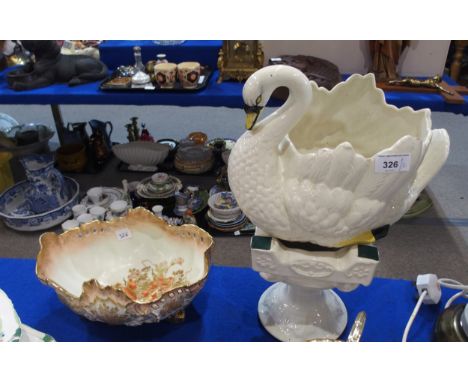 A pottery swan planter on stand together with a Limoges porcelain dish Condition Report:Available upon request