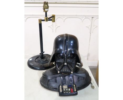 A vintage Darth Vader telephone, together with a painted metal adjustable table lamp (2) Condition Report:Available upon requ