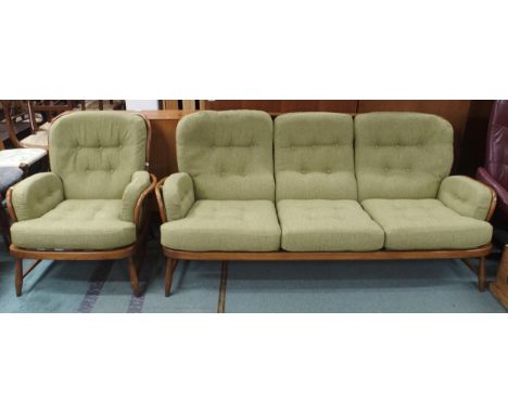 A lot comprising a mid 20th century elm and beech Ercol three seater settee, 83cm high x 195cm wide x 88cm deep and an accomp