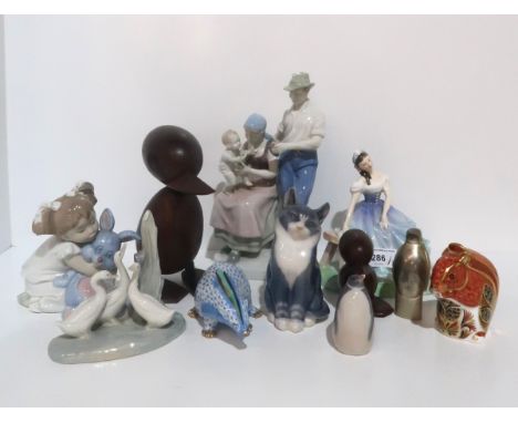 A&nbsp;Royal Doulton ballerina figure Giselle HN2139, a Royal Crown Derby squirrel, a Herend blue scale badger, a Royal Copen