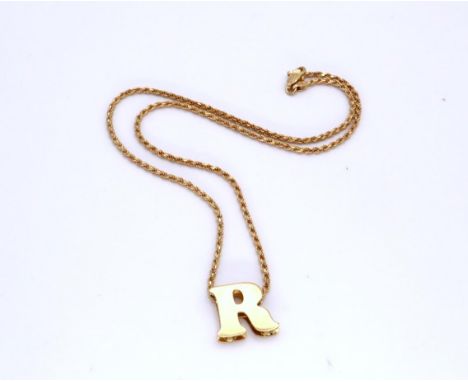 An Italian 18ct gold rope chain and 'R' pendant, length of chain 43cm, weight 10.8gms Condition Report:Available upon request