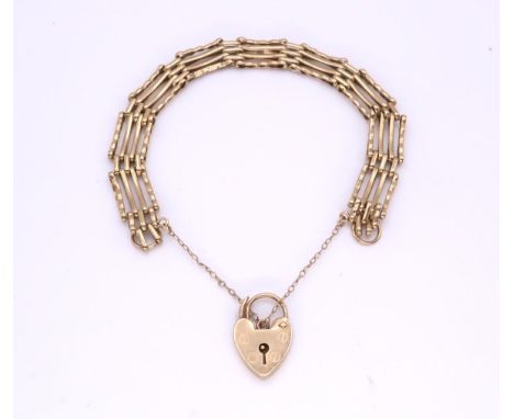 A 9ct gold gate bracelet with a heart shaped clasp, weight 10.2gms Condition Report:Available upon request