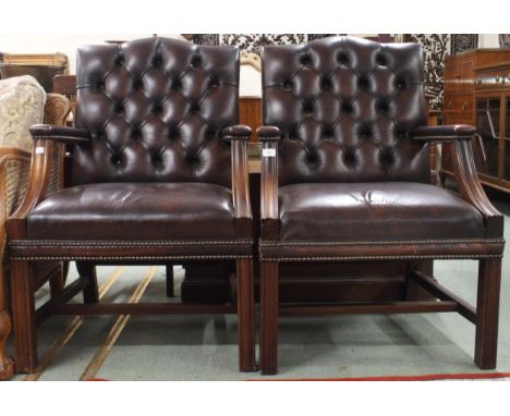 A pair of 20th century Georgian style button back leather upholstered armchairs, 94cm high x 63cm wide x 64cm deep (2) Condit