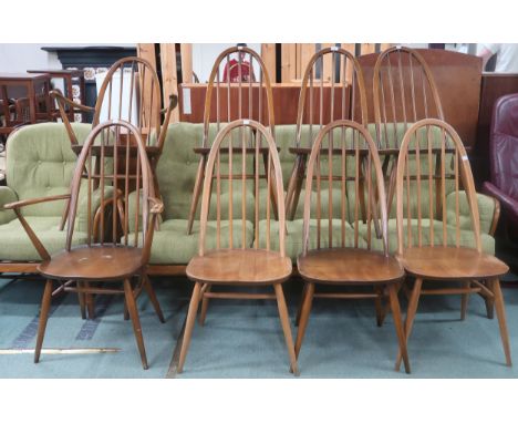 A set of eight mid 20th century elm and beech Ercol rail back dining chairs, 96cm high (8) Condition Report:Available upon re