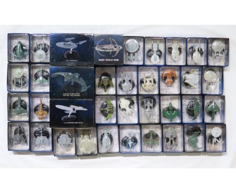 A large collection of boxed Star Trek scale model spacecraft produced by startrek.com/CBS Studios Condition Report:Available 