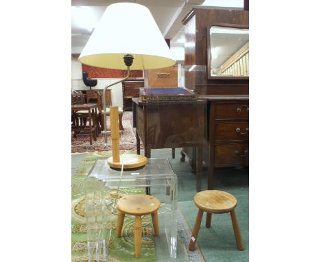 A lot comprising a contemporary ghost style nest of three tables, contemporary table lamp and two assorted small three legged