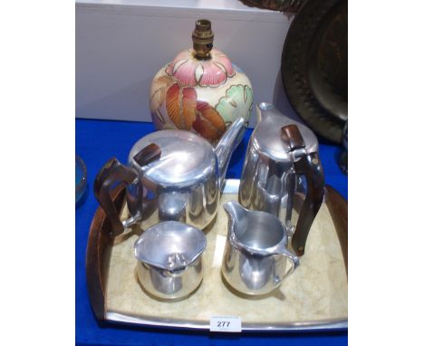 A Grays pottery table lamp together with a Picquot ware four piece teaset on tray Condition Report:Available upon request