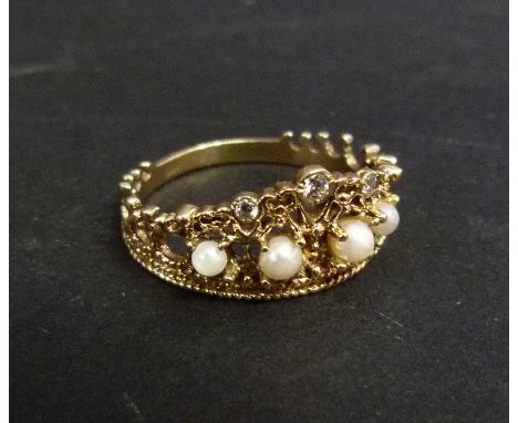 A 9ct. Gold Pearl and Diamond Set Ring in the form of a Crown