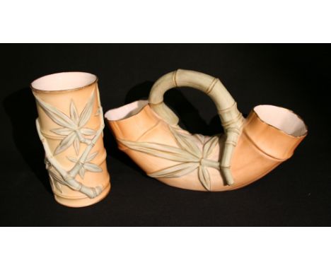 A Royal Worcester Porcelain Blush Ivory Double Spill Vase, in the form of bamboo, together with a similar Royal Worcester por