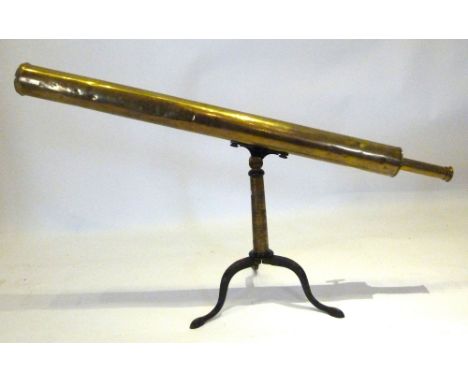 An Early 20th Century Brass Telescope inscribed W. Johnson, Tottenham Court Road and with patinated metal folding tripod, 110