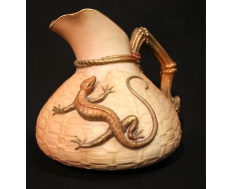 A Royal Worcester Blush Ivory Large Jug in the form of a Basket, with lizard surmount and highlighted with gilt, 15cms tall