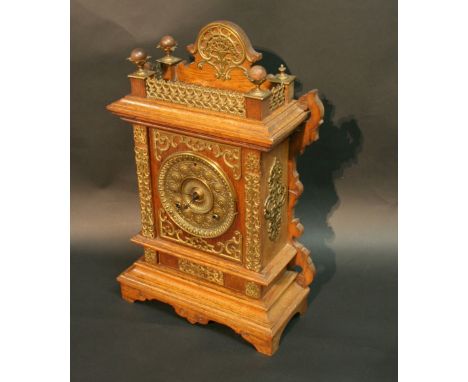 An American Gilt Metal Mounted Mantle Clock, the brass dial with Arabic numerals and two train movement 