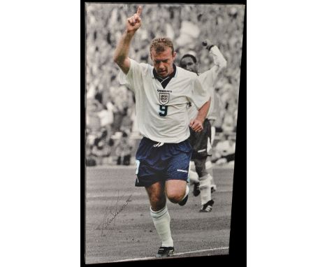An Alan Shearer signed photographic print.