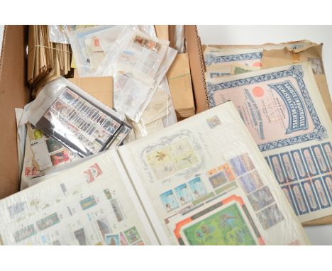 A large quantity of covers; stamps; packets; stock books; etc., mainly South African; together with a large quantity of share