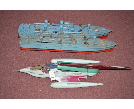 An electric powered radio control rocket boat; together with two other propeller powered boats.