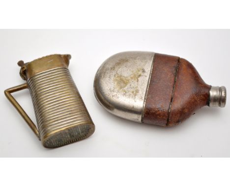 Two early 20th Century vesta cases, one in the for of a hip flask, with leather mount, 5.6cms; the other a covered jug, 4.5cm