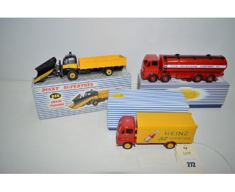 A Dinky Supertoys snow plough, 5958, boxed; together with two reproduction Dinky Supertoys vehicles, one of an Esso Petroleum