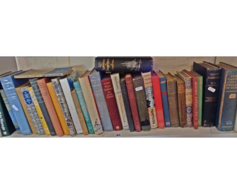 Long shelf of assorted books on Exploration