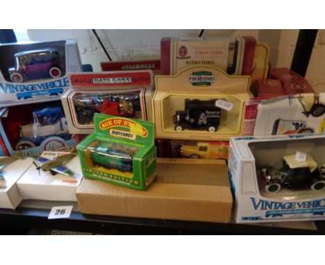 Shelf of modern diecast vehicles and planes