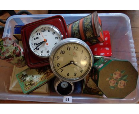 Bengt EK design aluminium wall clock (missing timer), a Kienzle wall clock, and a collection of tins