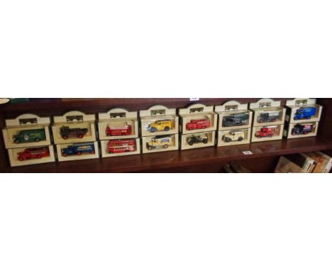 Long shelf of modern diecast Lledo vehicles (boxed)