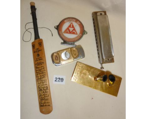 1950s Australian tour commemorative cricket bat, Hohner harmonica, cigar cutter, car grille badge, etc.