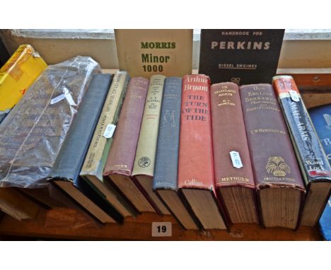 Shelf of books, including Debretts Peerage 1899, handbooks for Triumph Mayflower, Morris Minor and Perkins Diesel Engines, et