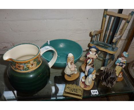 Large Jersey Pottery pitcher, four Royal Orleans porcelain figures and other items