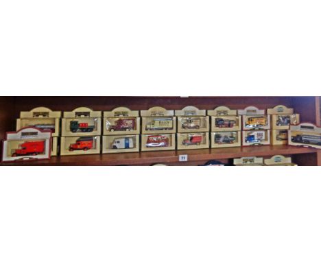 Long shelf of modern diecast Lledo vehicles (boxed)