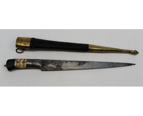 A 19th century Indo-Persian dagger/ Pesh Kabz. Bone and steel with armour piercing tipped 28.5cm blade, in leather and brass 