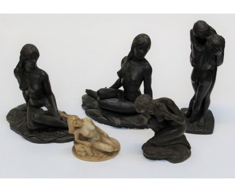 Four bronzed plaster moulded nude studies together with a resin cast model. The largest, 34cm