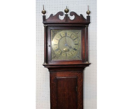 John Calver of Suffolk, a mid 18th century oak longcase clock. The thirty hour movement striking upon a bell, faced by twelve