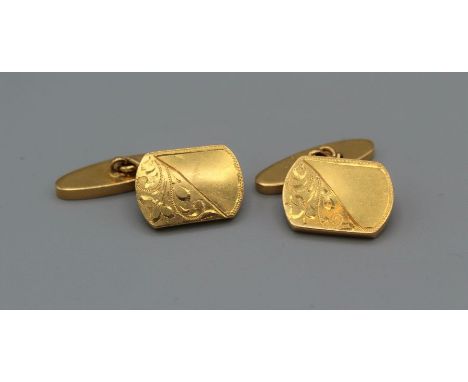 A pair of yellow metal chain link cufflinks, engraved with foliate patterns, gross weight approximately 15.9gm