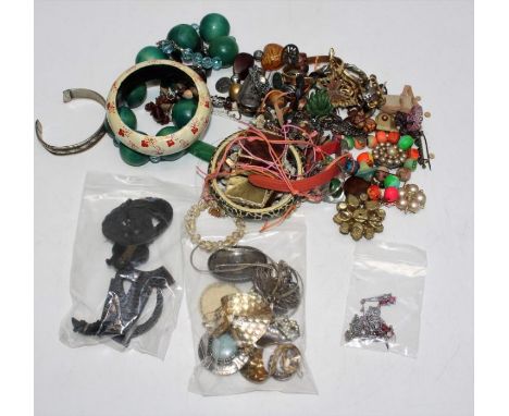 A selection of antique, vintage and cotemporary costume jewelley. To include two red paste Art Deco style necklaces, Irish bo