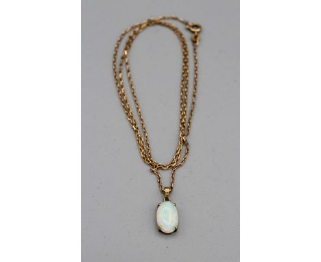 An Australian opal 14k stamped pendant on a 20'' 9ct gold hallmarked chain, 9ct 3gm