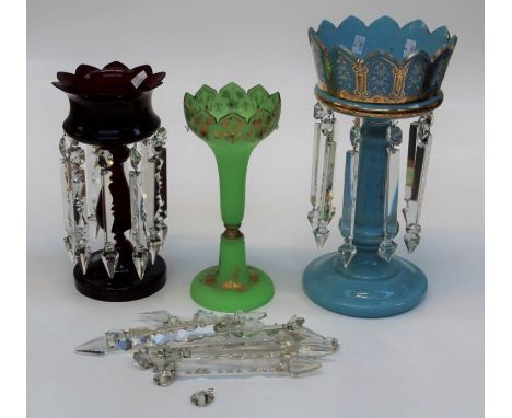 An Edwardian ruby glass table lustre with icicle pendant drops, 33cm together with a turquoise glass lustre, 41cm and an appl