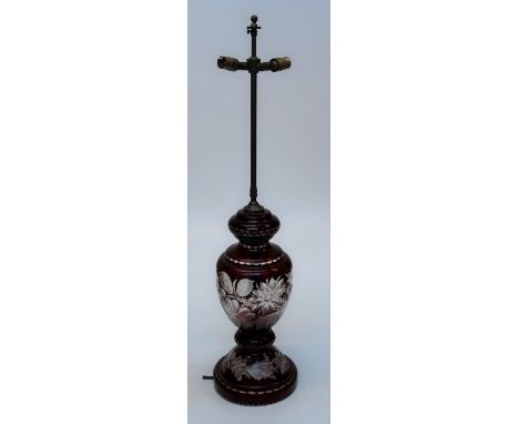 An early 20th century Bohemian ruby flash glass table lamp of generous size with twin brass light fittings. Total height 84cm