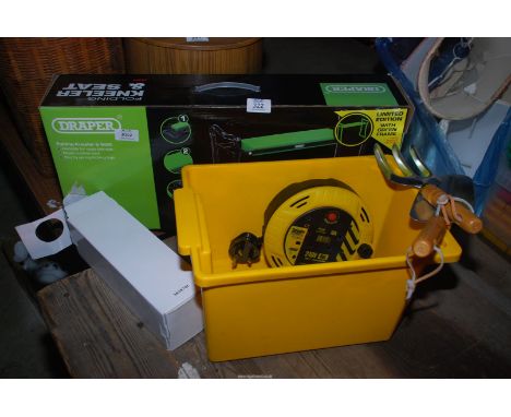 A folding kneeler, trowel &amp; fork and a small torch, electrical extension lead, etc.,