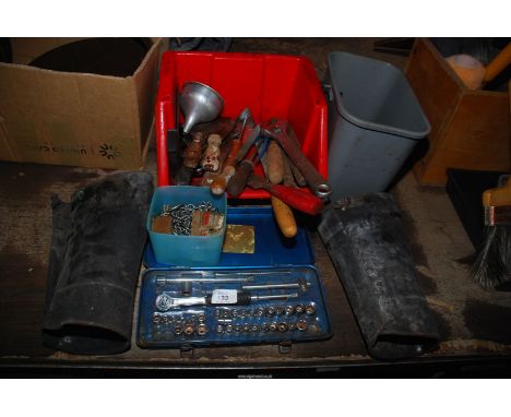 A tray of files, socket set, pair of leather gaiters, adjustable spanner and scrapers.