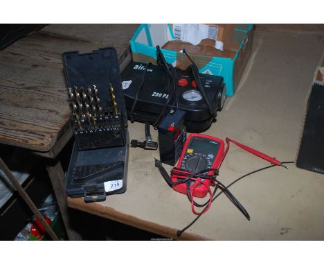 A low voltage car tyre inflator, high speed metal drill bits and an amp tester.