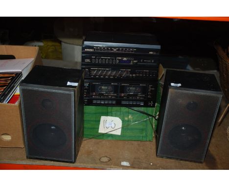 A Matsui mini 55 record and cassette player with speakers.
